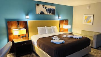 Deluxe Room, 1 King Bed | In-room safe, desk, iron/ironing board, free WiFi