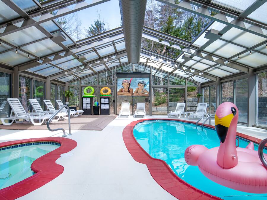 Indoor pool, seasonal outdoor pool, open 9 AM to 9 PM, pool loungers