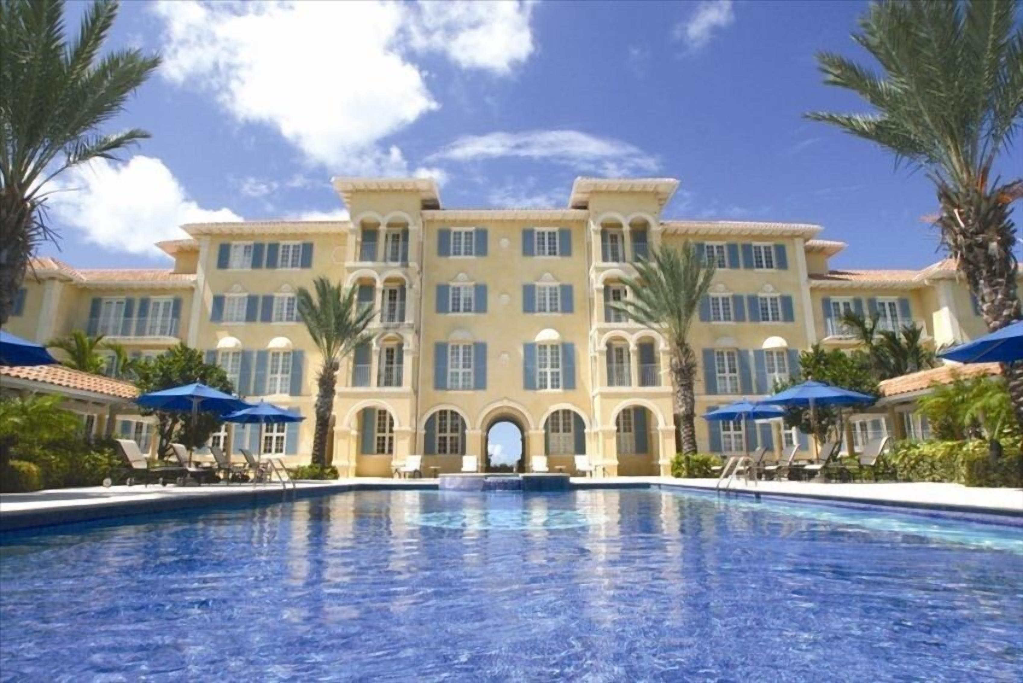 outdoor pool, pool umbrellas, pool loungers