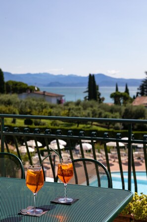 Standard Suite, 2 Bedrooms, Balcony, Lake View | Premium bedding, down comforters, in-room safe, individually decorated - Le Terrazze Sul Lago Residence & Hotel (Padenghe sul Garda)