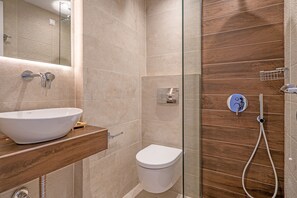 Triple Room | Bathroom | Shower, hair dryer, bathrobes, slippers