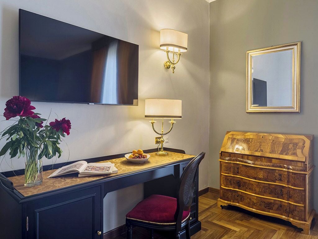 Triple Room | Minibar, in-room safe, blackout drapes, soundproofing