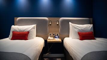 Blackout drapes, soundproofing, iron/ironing board