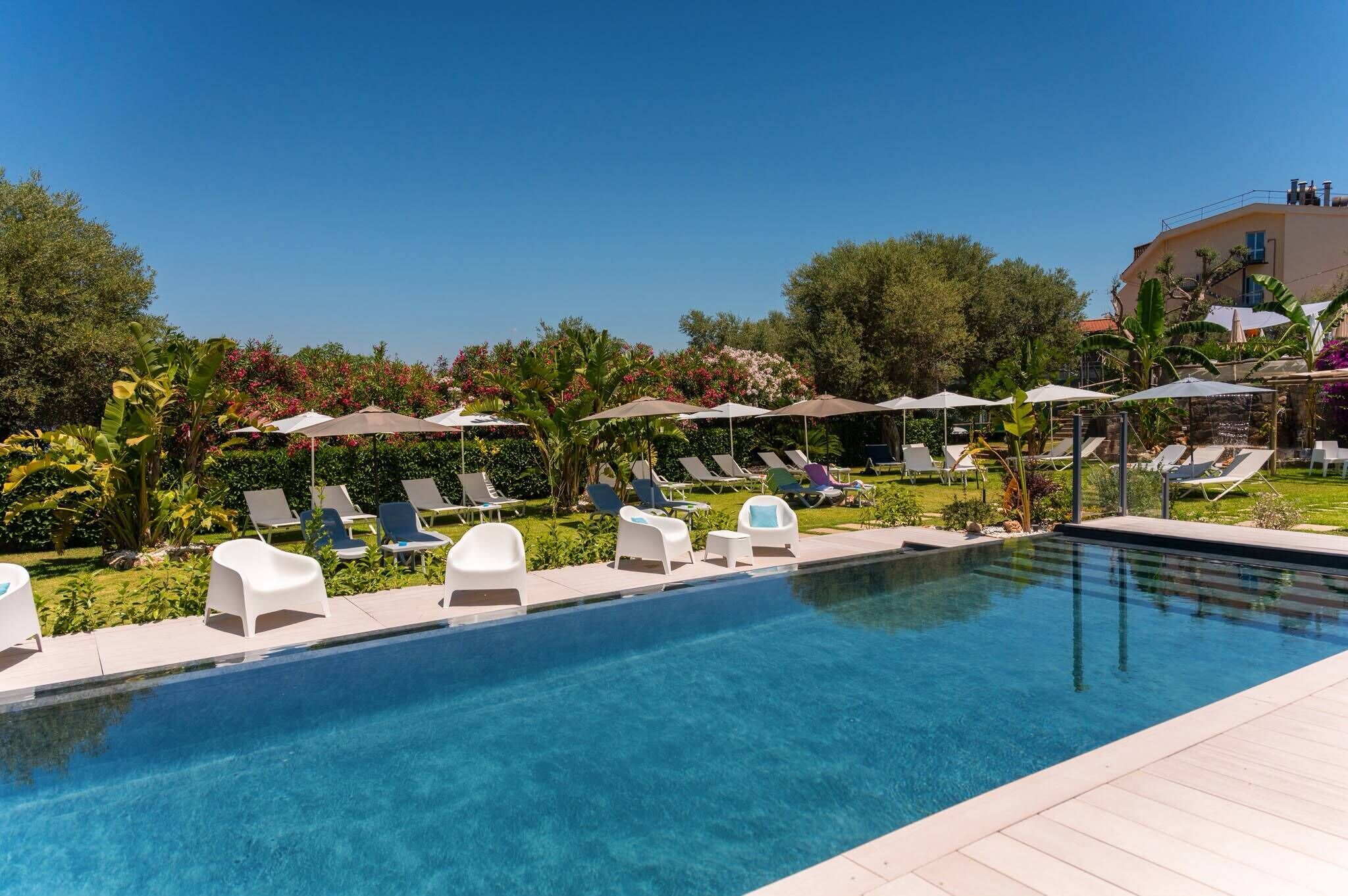 Seasonal outdoor pool, pool umbrellas, sun loungers