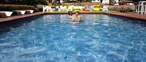 Outdoor pool, pool umbrellas, pool loungers