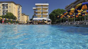 Outdoor pool, pool umbrellas, sun loungers