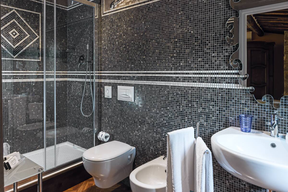 suite, private bathroom | bathroom | hair dryer, bidet, towels