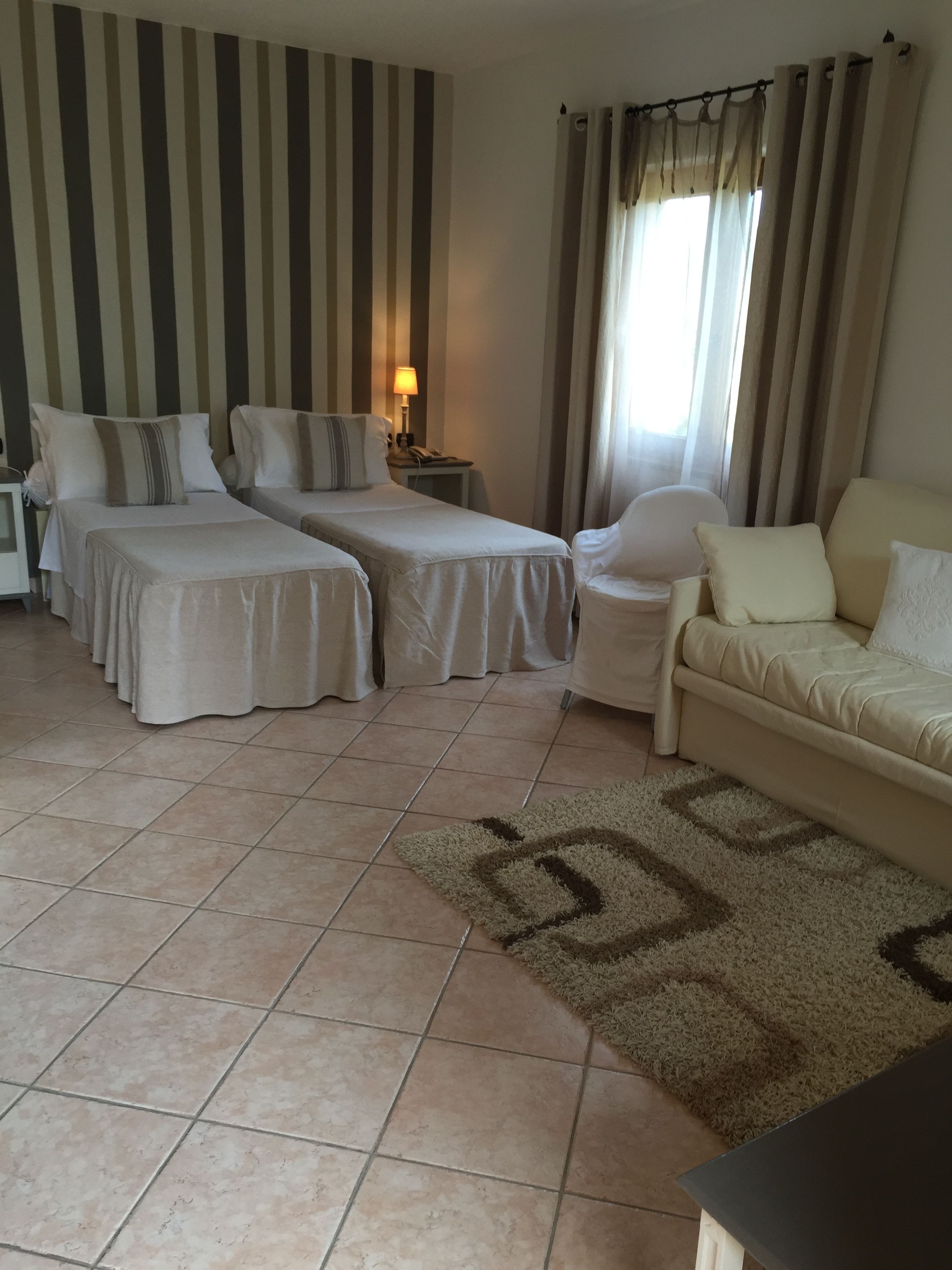 junior suite | minibar, in-room safe, desk, bed sheets