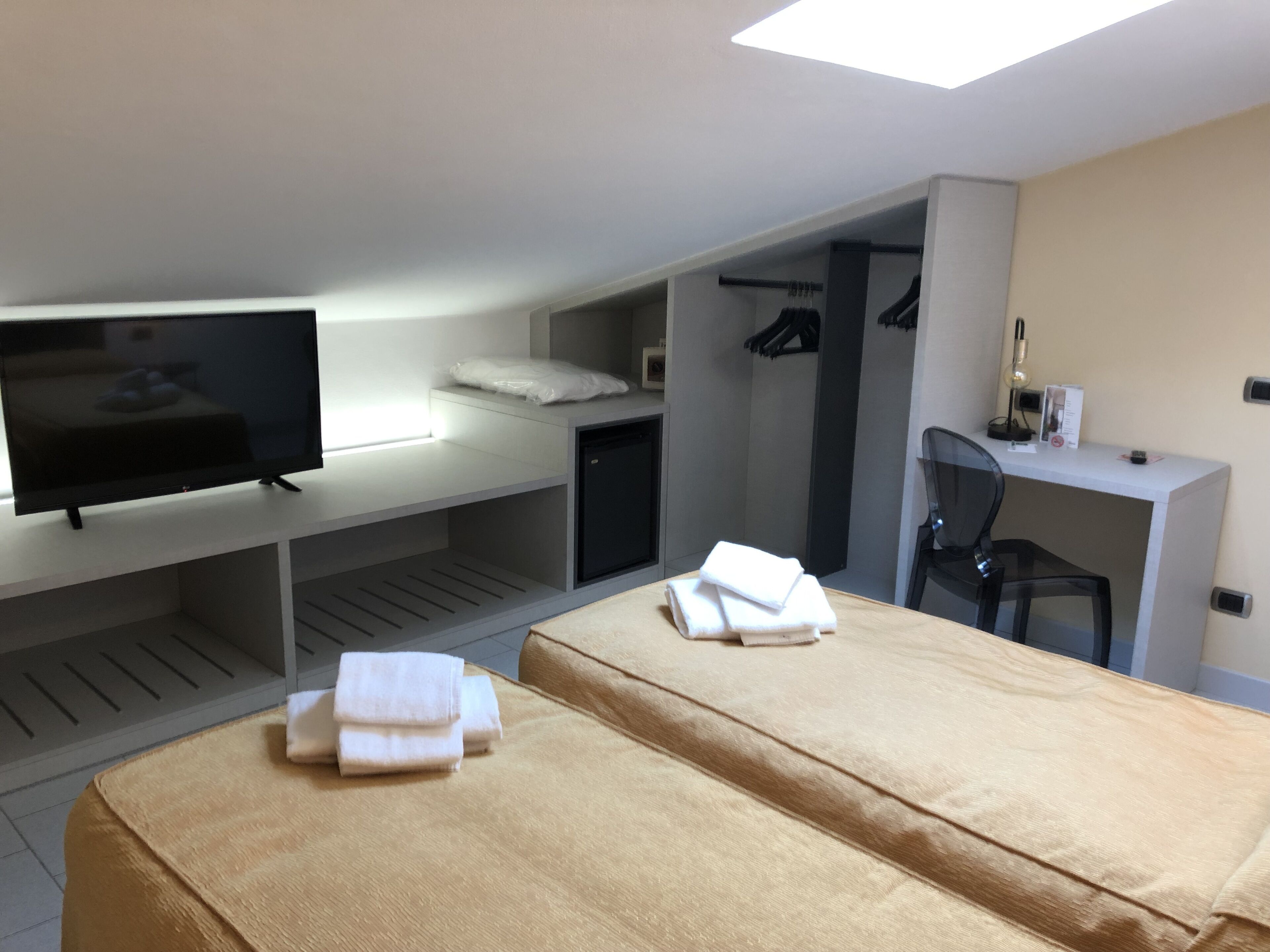 economy double or twin room (attic) | frette italian sheets, in-room safe, desk, laptop workspace