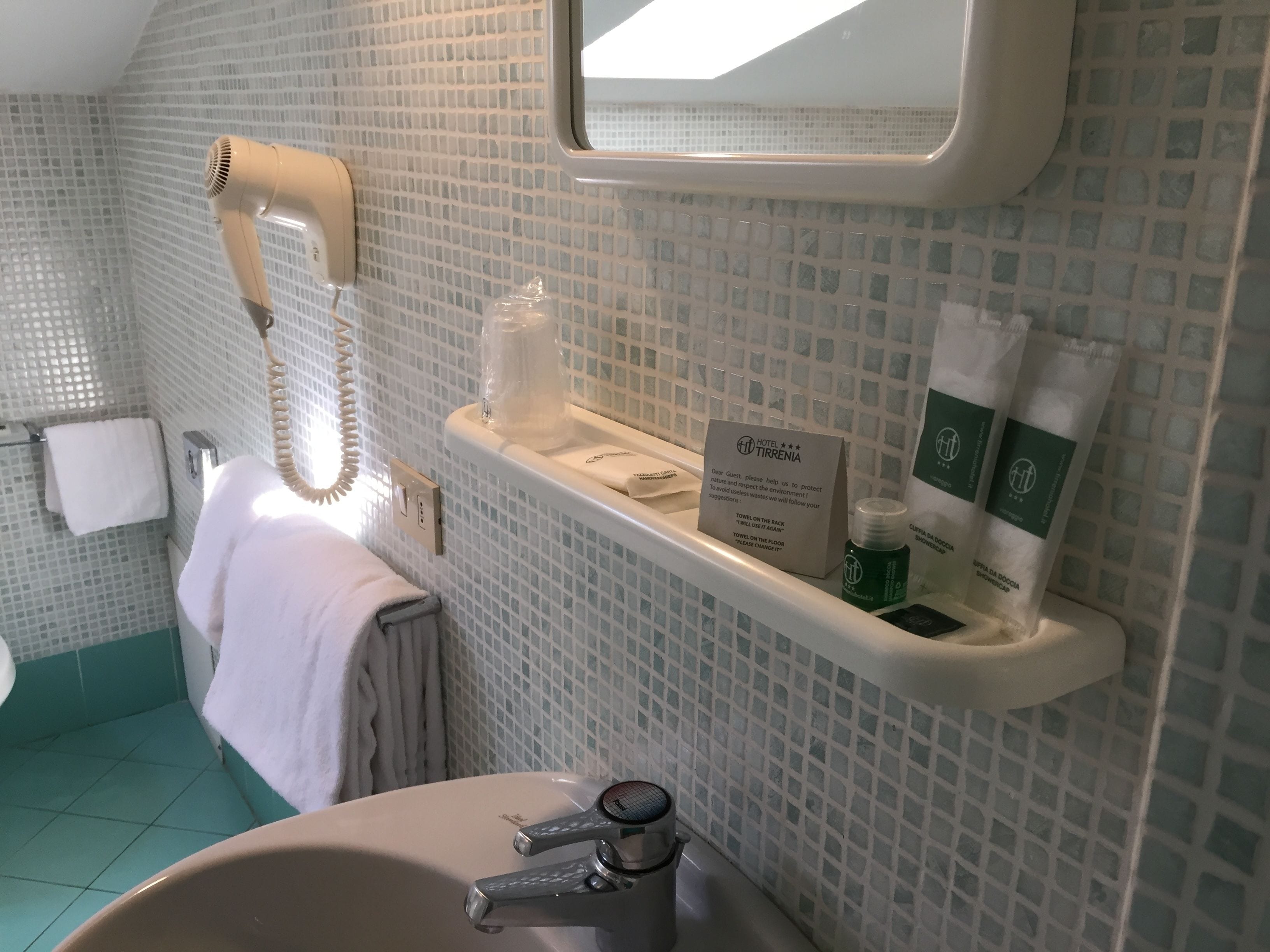 economy double or twin room (attic) | bathroom | shower, eco-friendly toiletries, hair dryer, towels