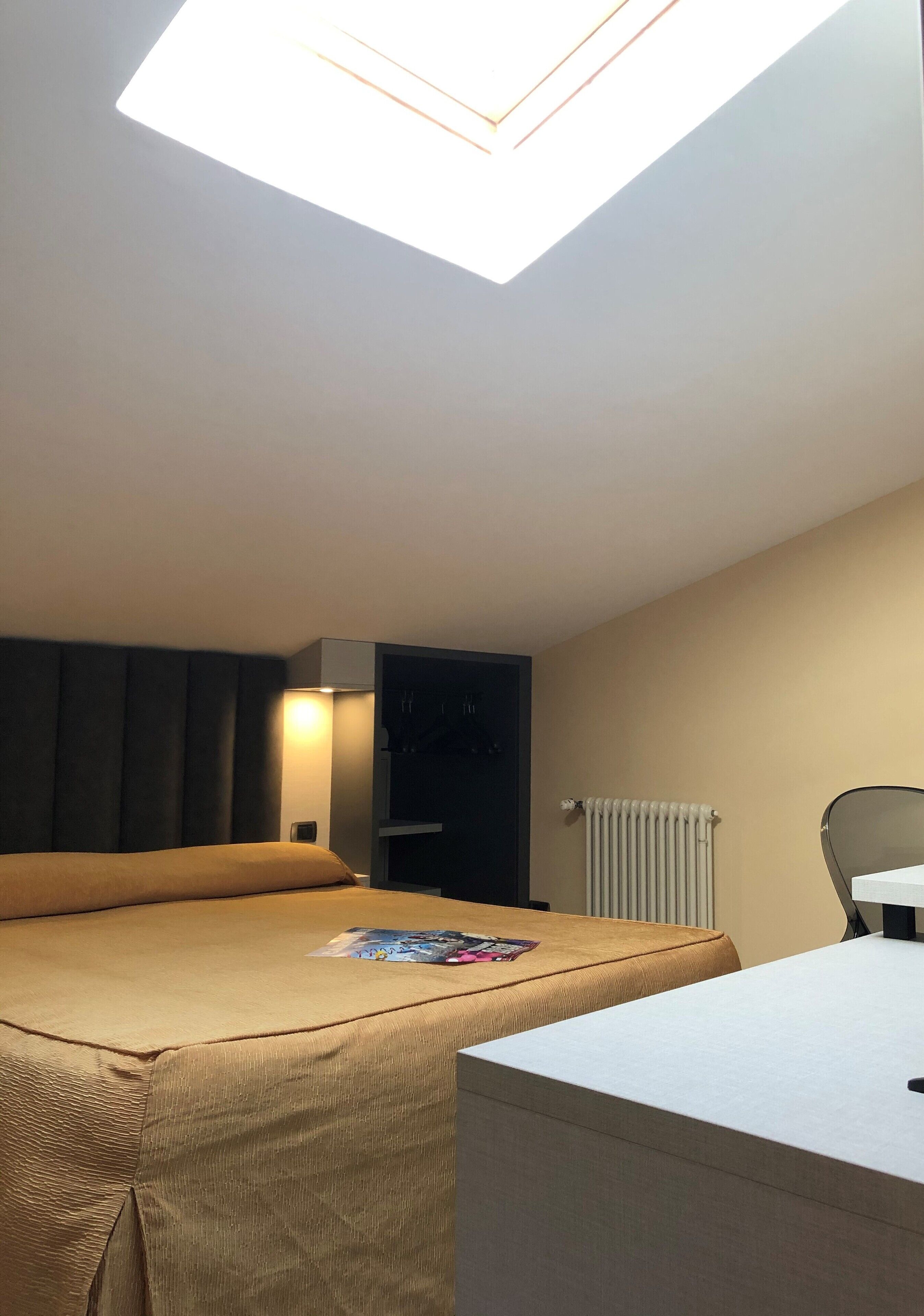 economy double or twin room (attic) | frette italian sheets, in-room safe, desk, laptop workspace