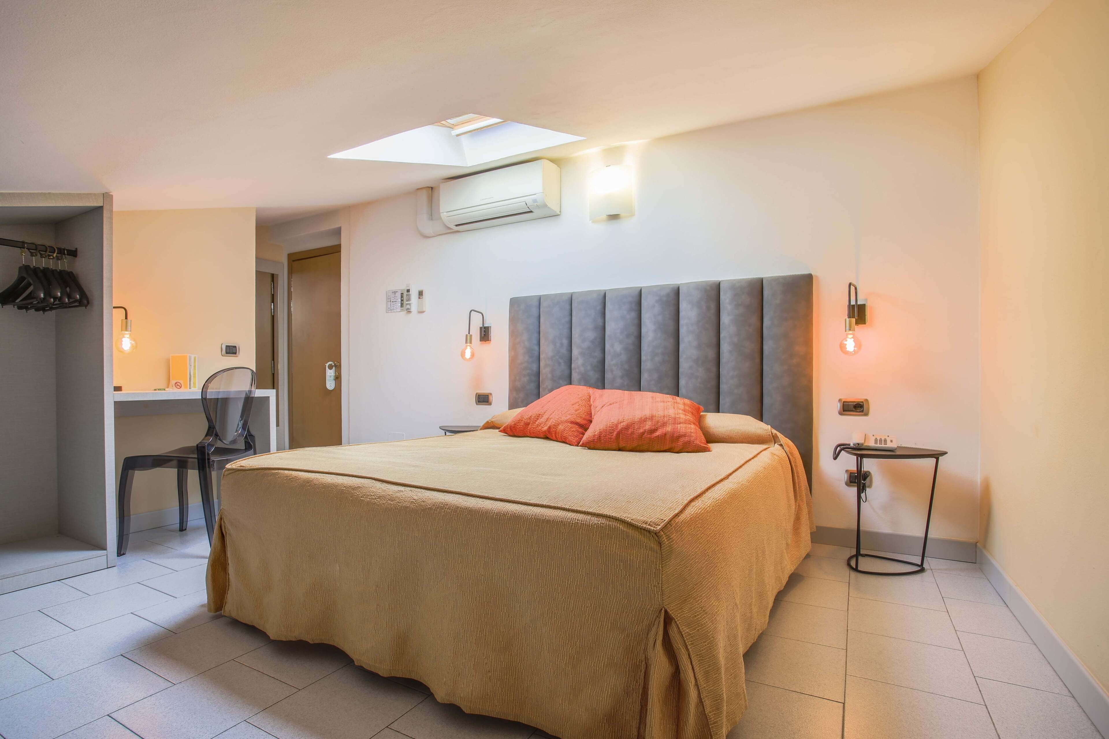 economy double or twin room (attic) | frette italian sheets, in-room safe, desk, laptop workspace