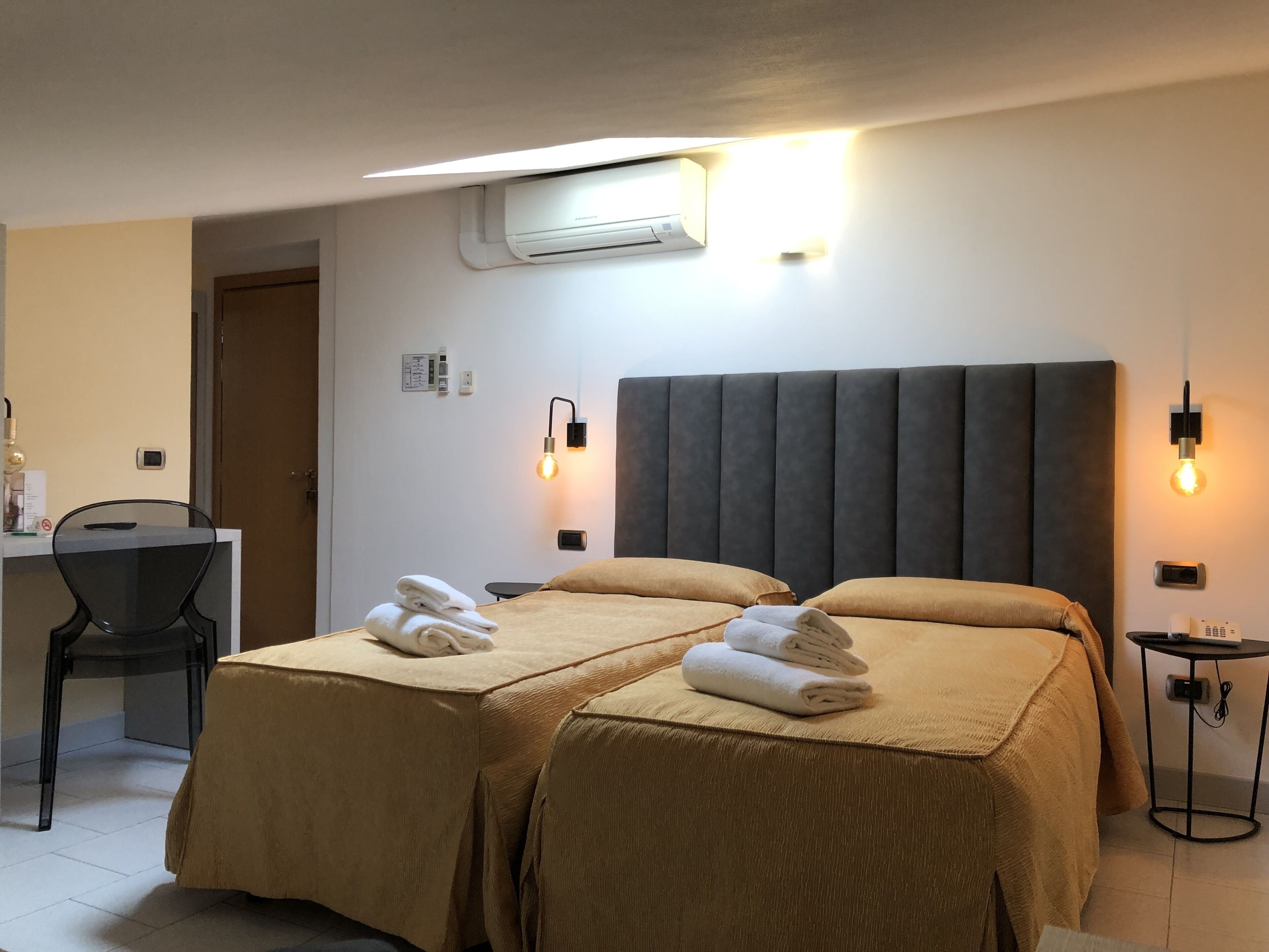 economy double or twin room (attic) | frette italian sheets, in-room safe, desk, laptop workspace