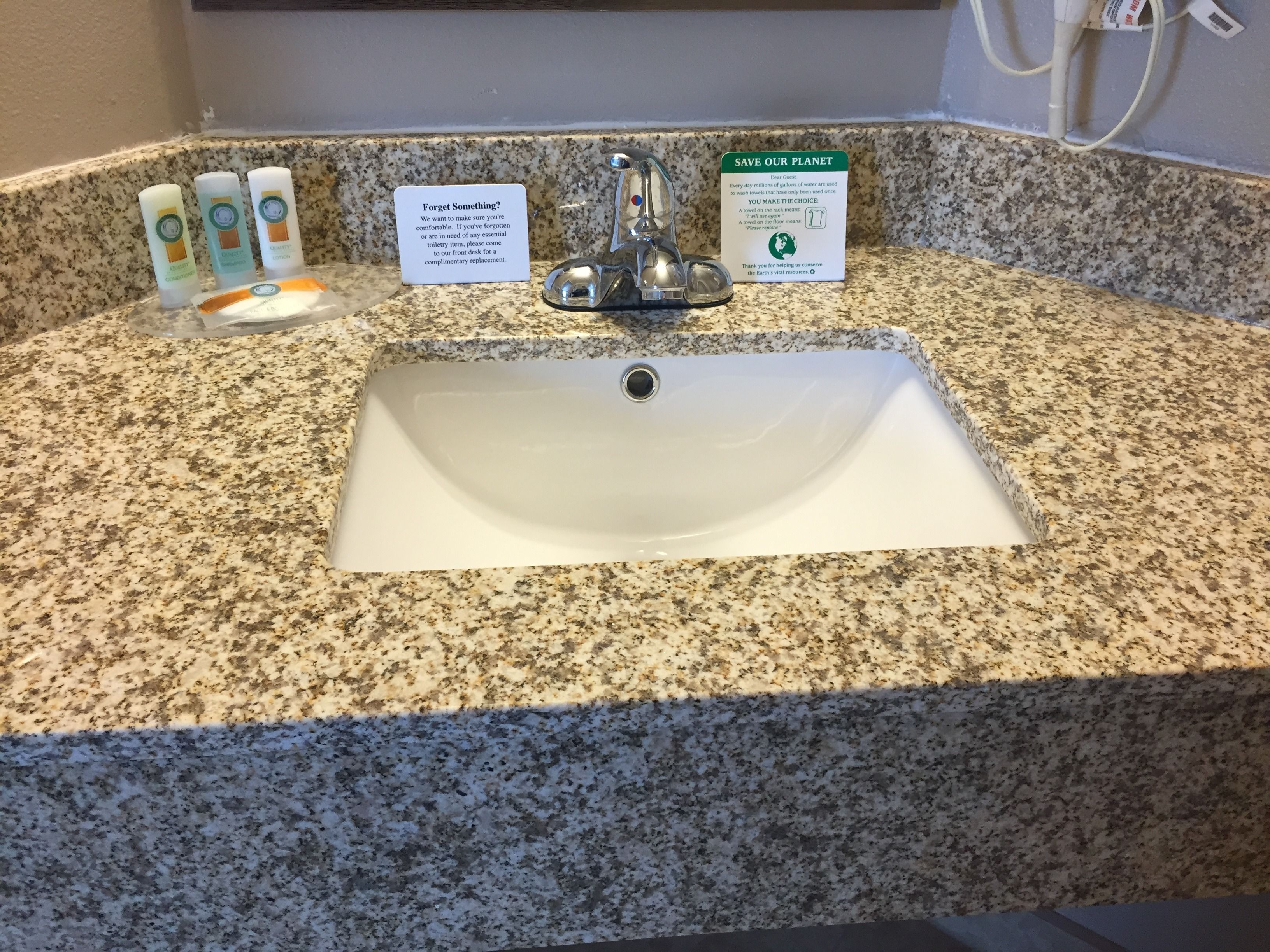 bathtub, hair dryer, towels