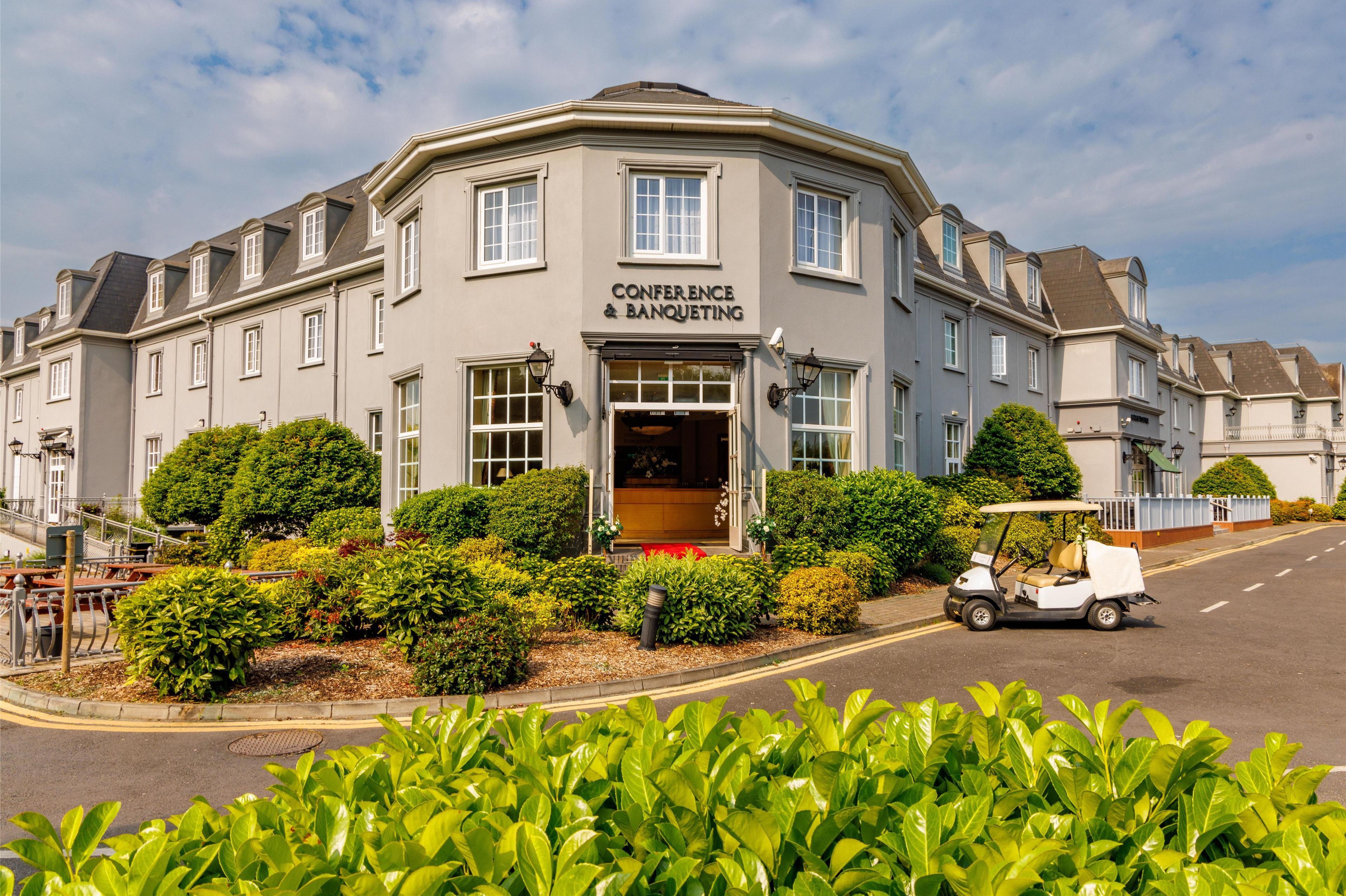 A building with a sign reading "Conference & Banqueting."