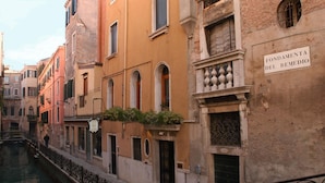 A canal-side building with a sign reading "FONDAMENTA DEL REMEDIO." - Hotel Locanda Canal (Venice)
