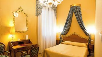 Quadruple Room | Minibar, in-room safe, desk, blackout drapes