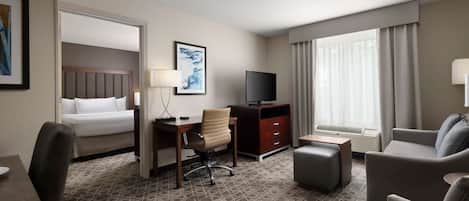 Premium bedding, desk, laptop workspace, iron/ironing board