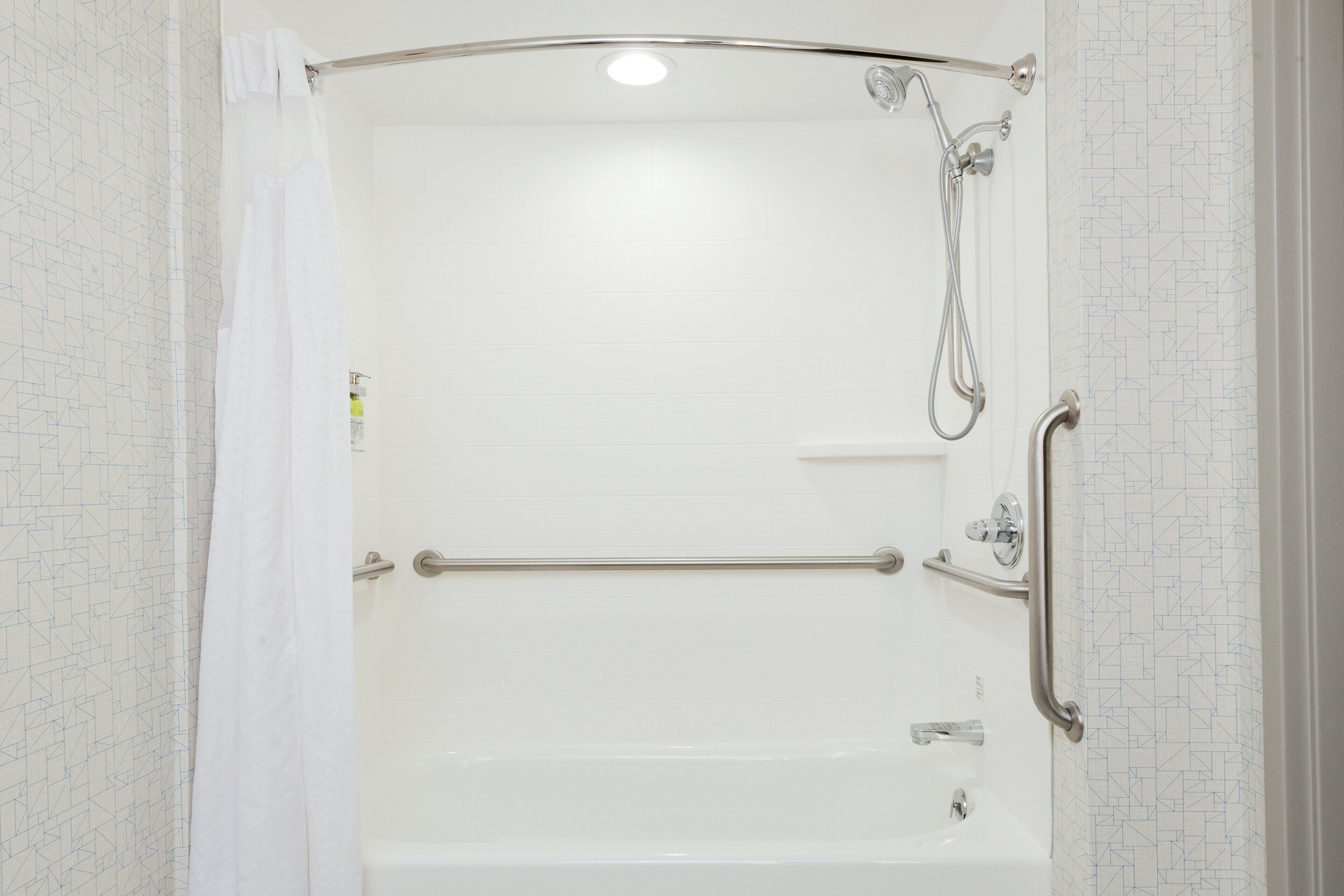 standard room, 1 king bed, accessible (comm, accessible tub) | in-room safe, desk, iron/ironing board, free rollaway beds