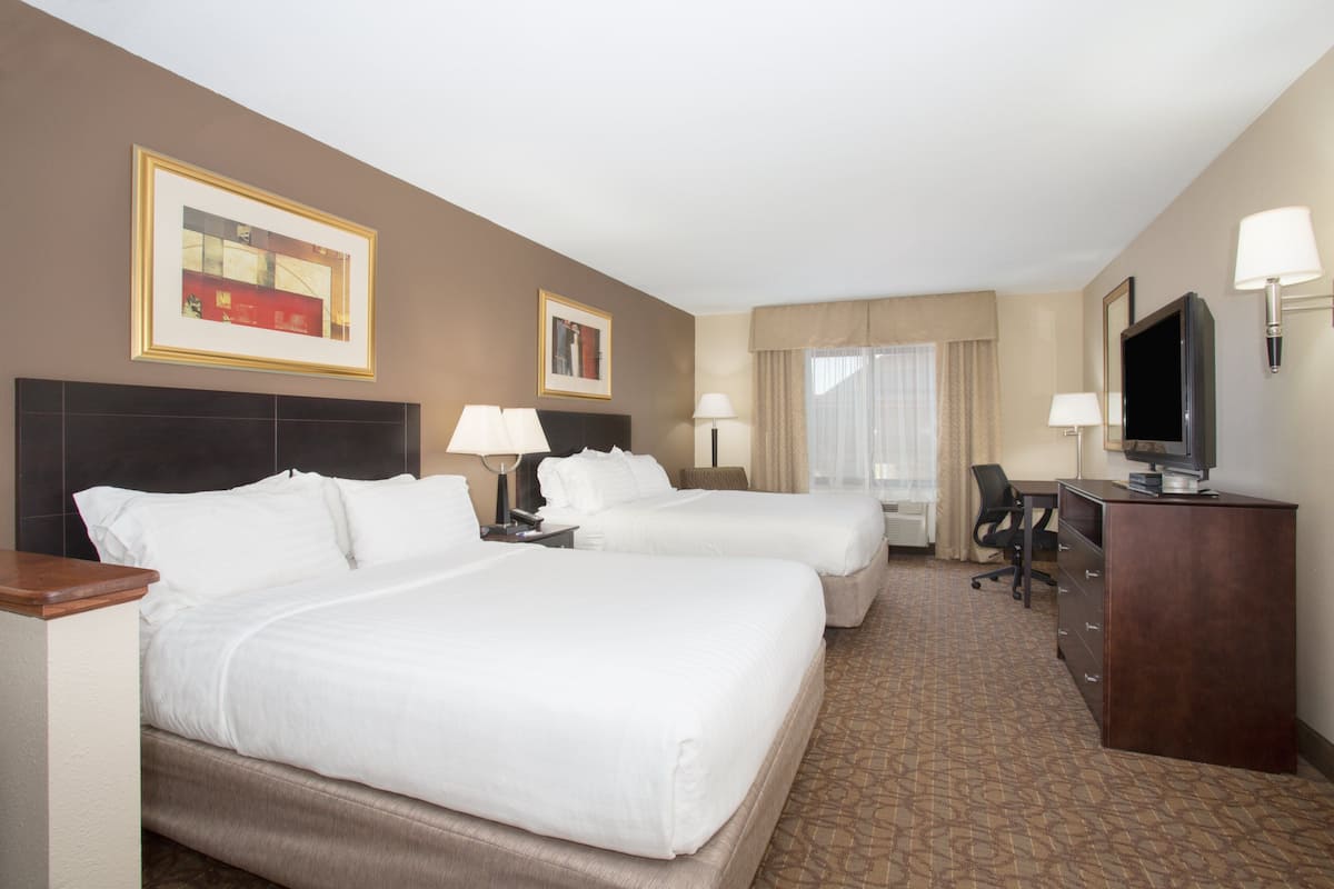 Premium bedding, pillowtop beds, desk, laptop workspace