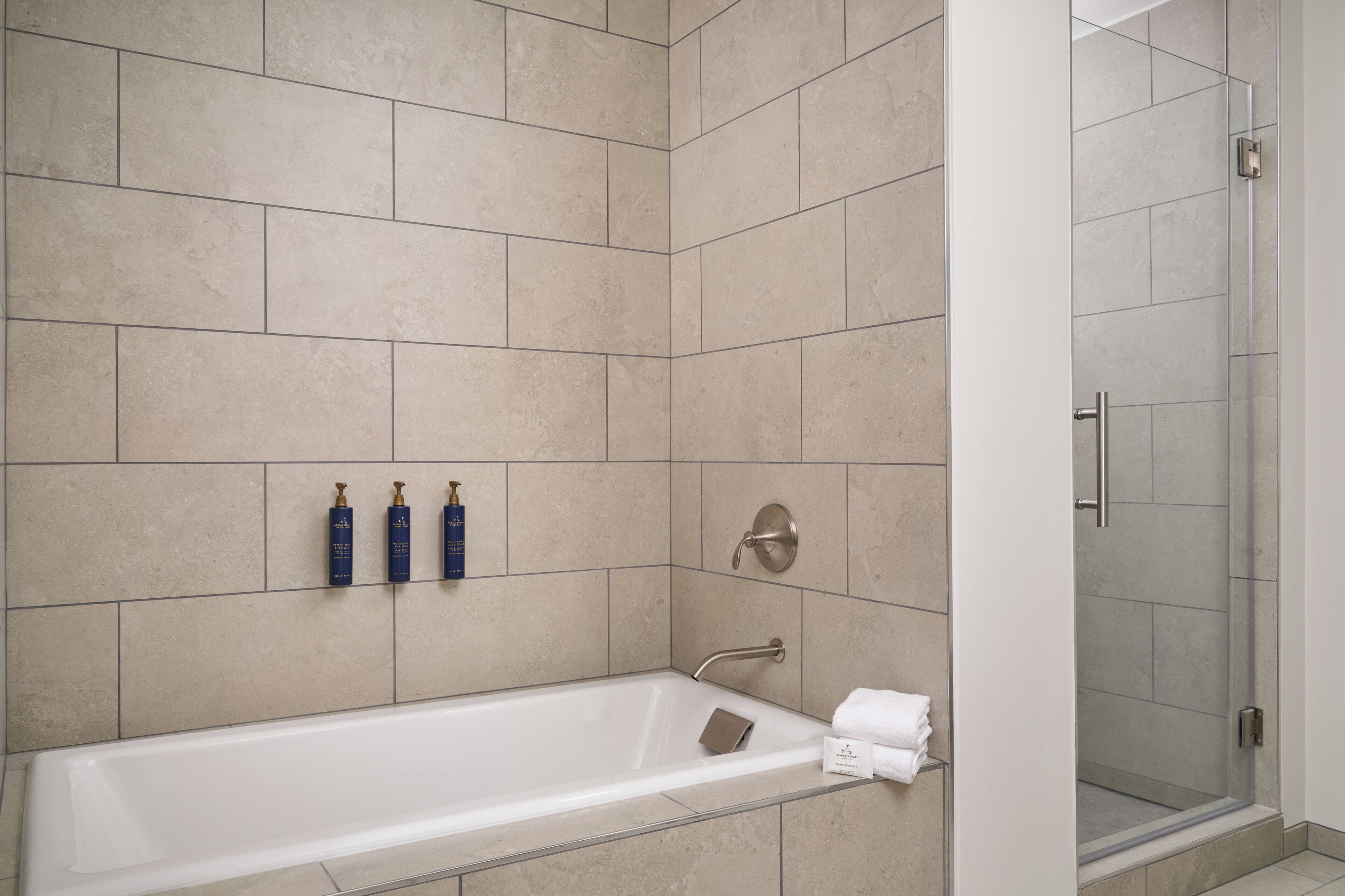 combined shower/bathtub, eco-friendly toiletries, hair dryer, towels