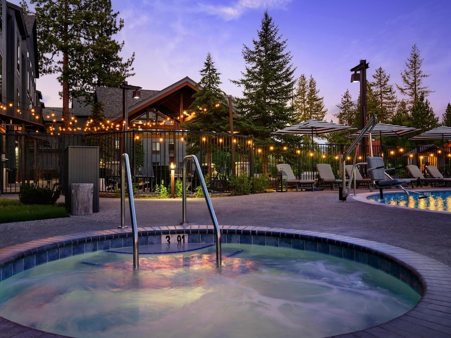 Seasonal outdoor pool, open 8:00 AM to 10:00 PM, pool umbrellas