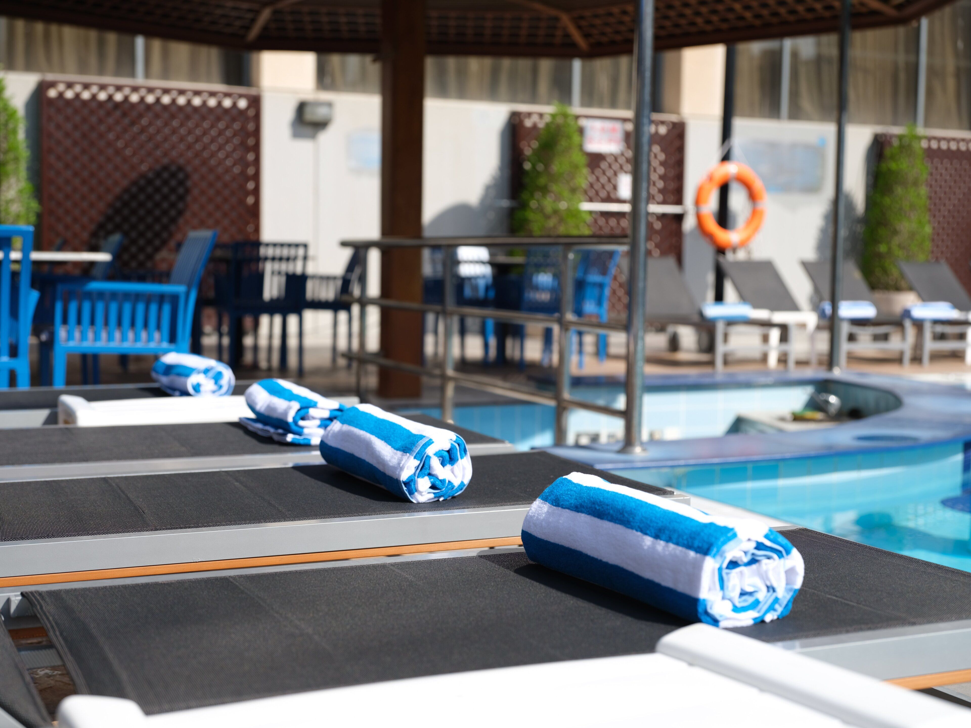 outdoor pool, pool loungers
