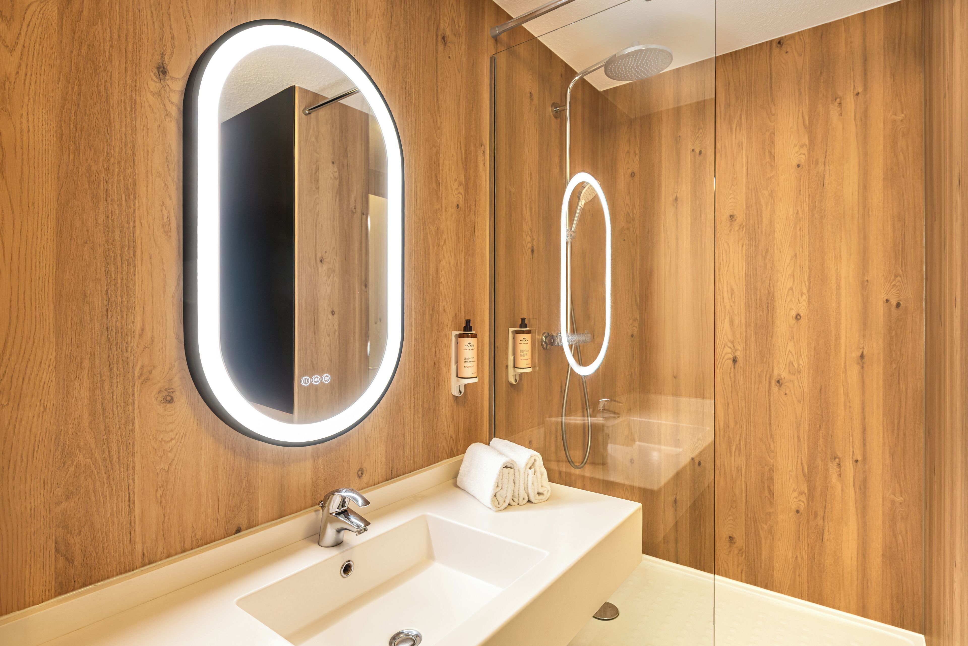 shower, eco-friendly toiletries, hair dryer, towels