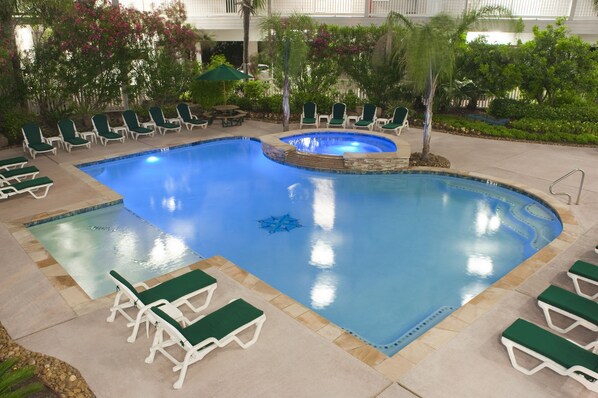 2 outdoor pools, a heated pool, open 9:00 AM to 10:00 PM, pool umbrellas - Casa Del Mar Beachfront Suites (Galveston)