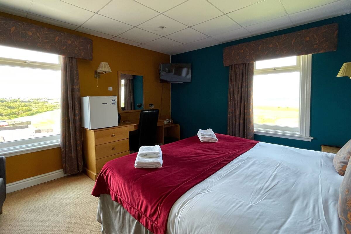 In-room safe, desk, blackout curtains, iron/ironing board
