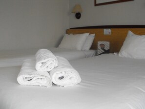 Hypo-allergenic bedding, desk, laptop workspace, iron/ironing board
