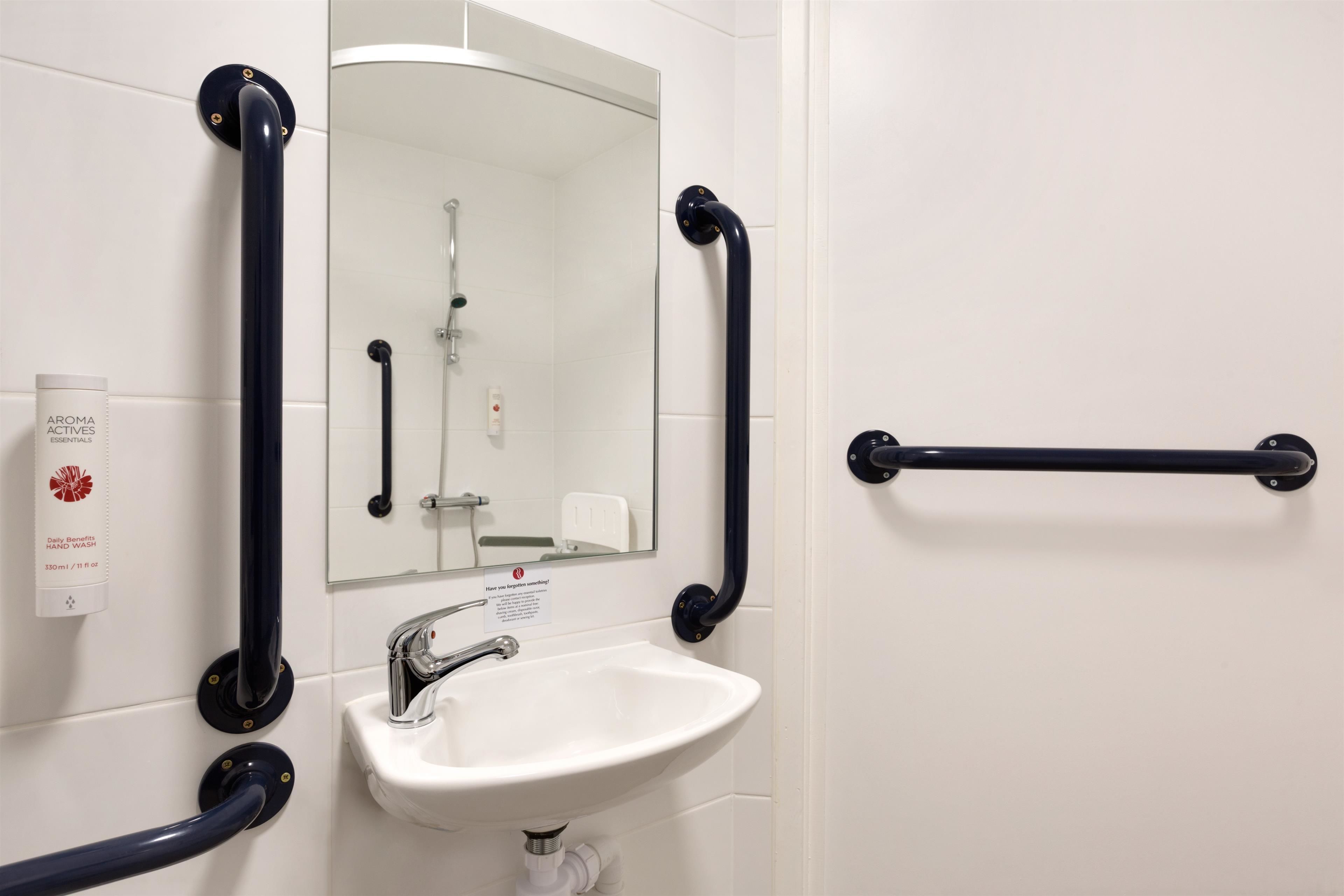 room, 1 single bed, accessible, non smoking (mobility/hearing, roll-in shower) | bathroom | shower, eco-friendly toiletries, hair dryer, towels