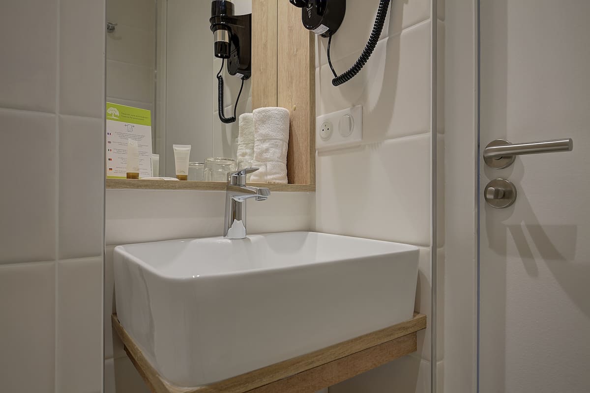 comfort triple room | bathroom | free toiletries, hair dryer, towels