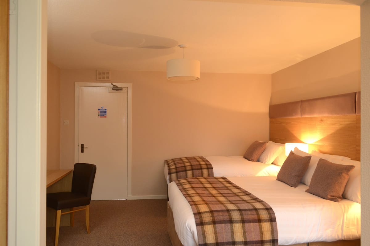 In-room safe, WiFi (free), alarm clocks, bed sheets