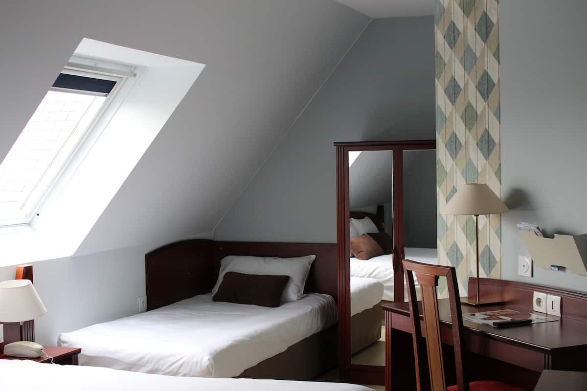 Desk, blackout curtains, free WiFi, bed sheets