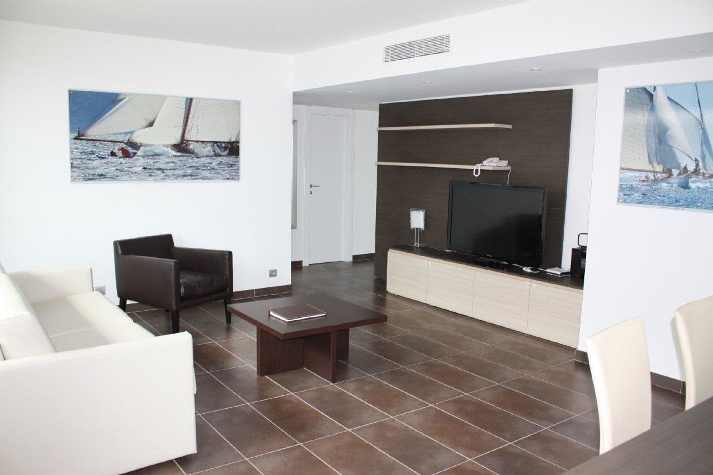 family apartment, street view | living area | 80-cm flat-screen tv with digital channels, tv