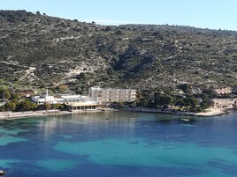On the beach, sun loungers, beach umbrellas, beach towels