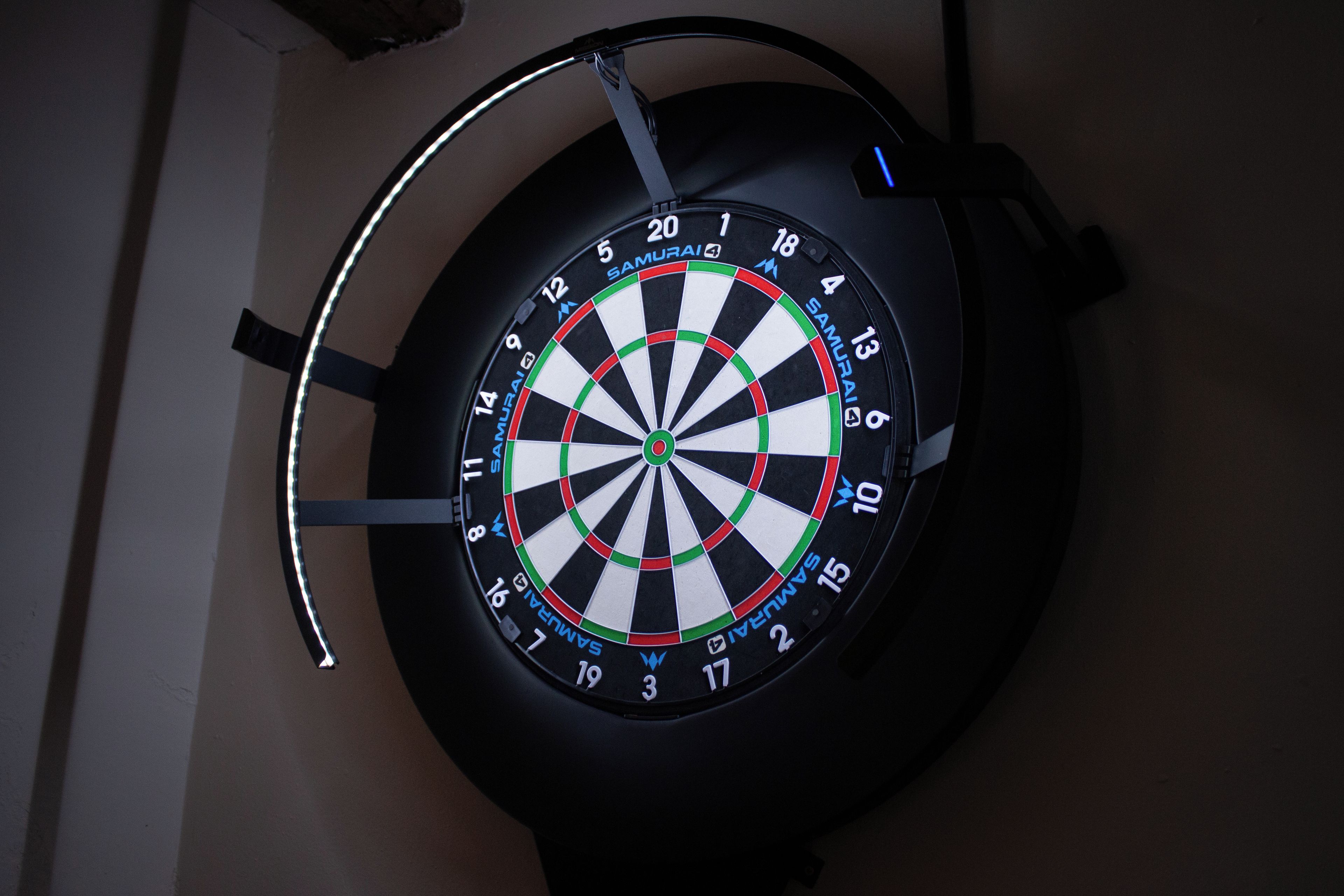 A dartboard mounted on a wall.