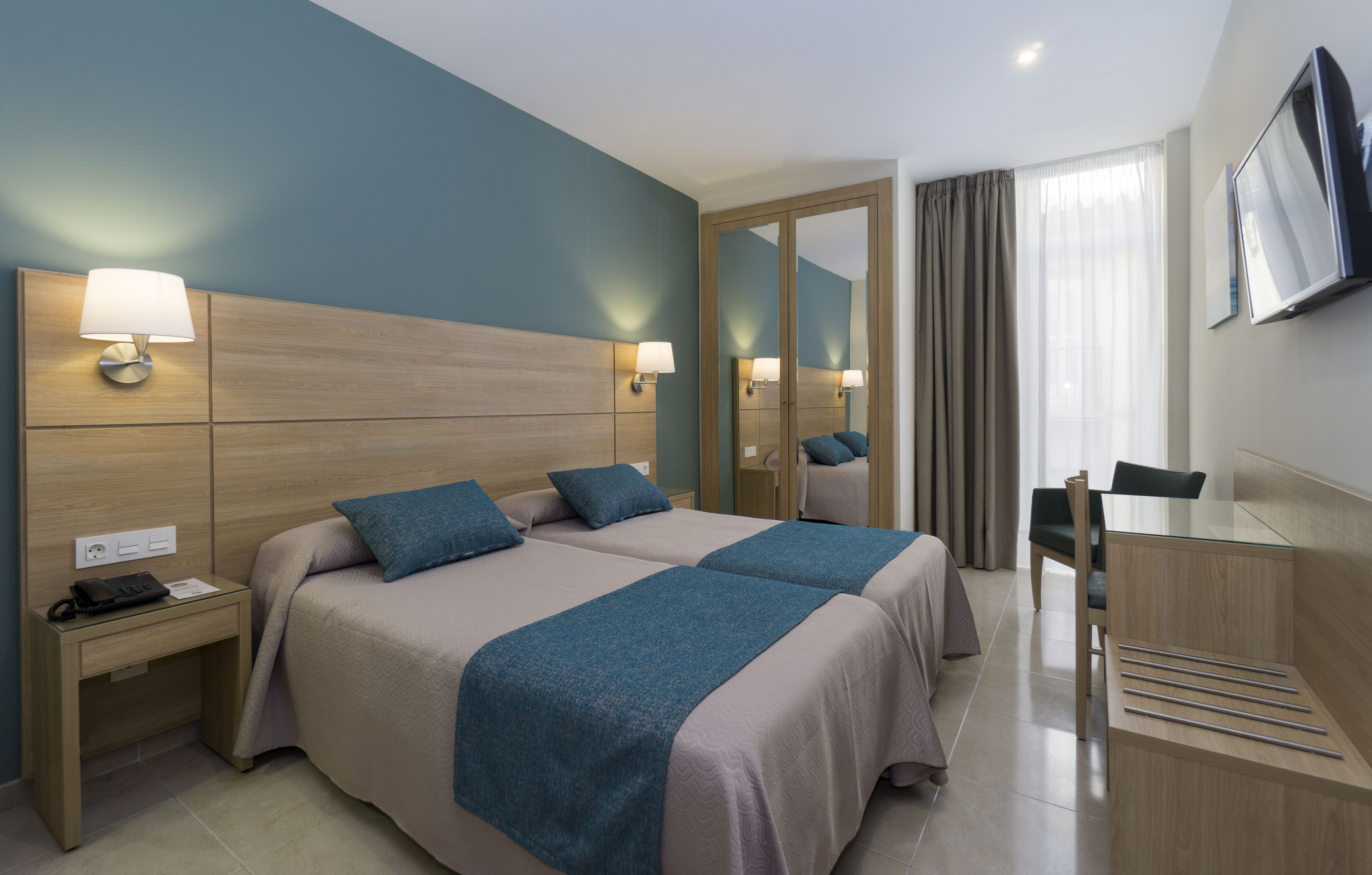 Desk, blackout drapes, rollaway beds, free WiFi