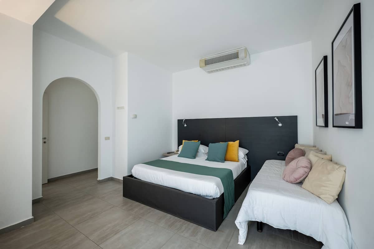 Comfort Triple Room, Partial Sea View | In-room safe, desk, soundproofing, free WiFi