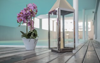 Indoor pool, a waterfall pool, sun loungers