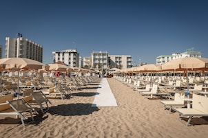 Private beach, sun loungers, beach umbrellas, beach volleyball