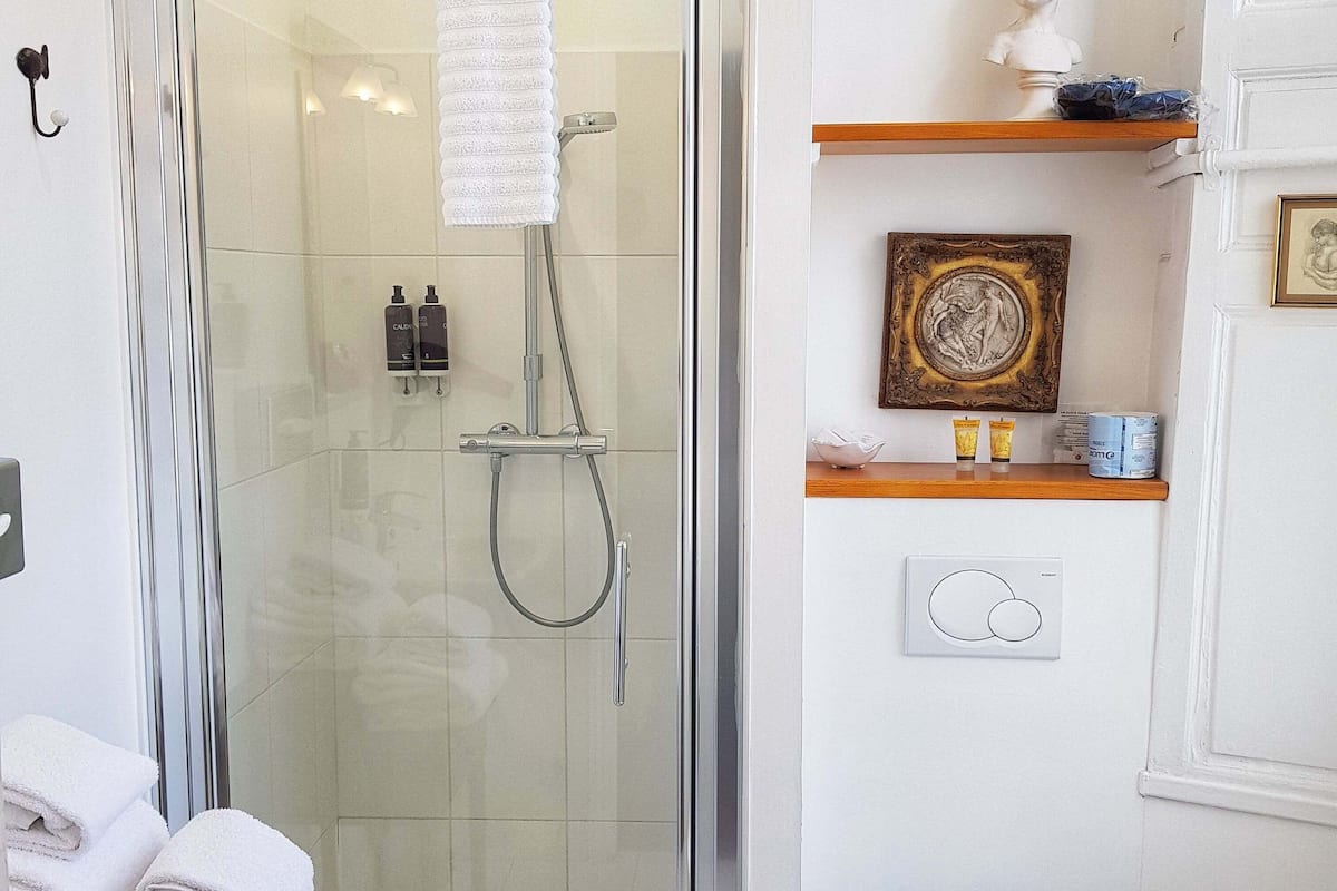 traditional double room | bathroom | shower, designer toiletries, hair dryer, bathrobes