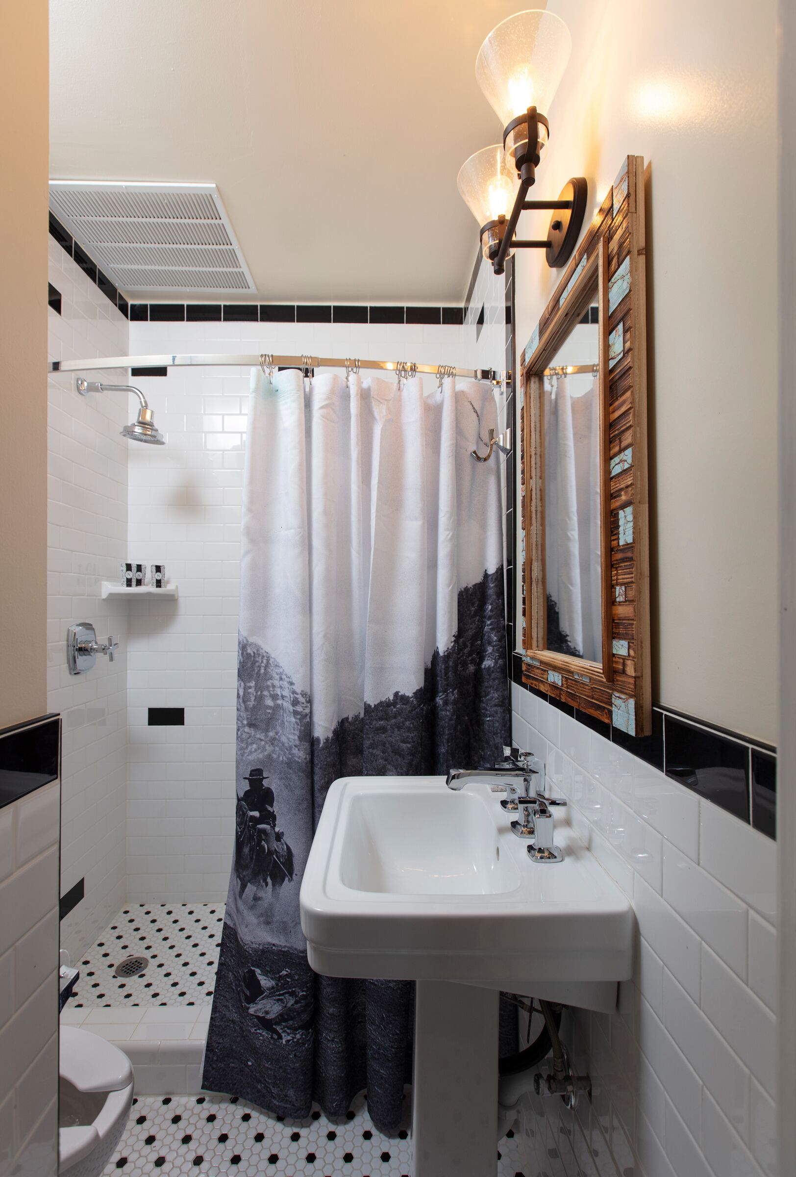 deluxe room, 1 king bed | bathroom | shower, free toiletries, hair dryer, towels