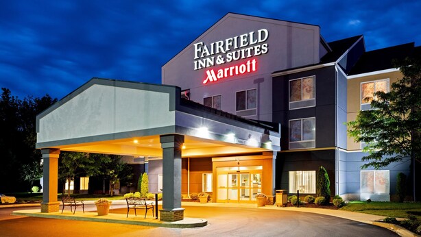 A Fairfield Inn & Suites Marriott hotel with a covered entrance, outdoor seating, and a well-lit facade. - Fairfield Inn & Suites by Marriott Elizabethtown (Elizabethtown)