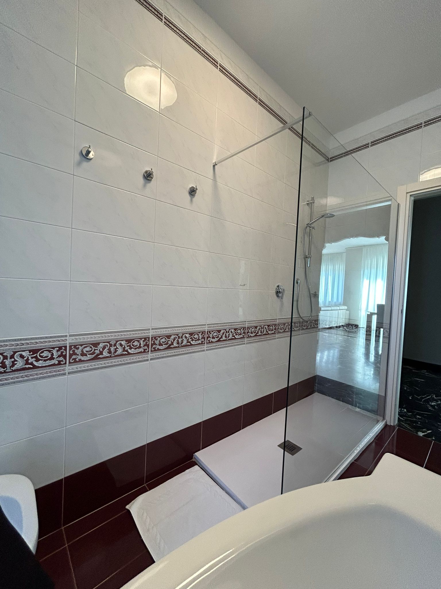 deluxe condo | bathroom | shower, rainfall showerhead, free toiletries, hair dryer