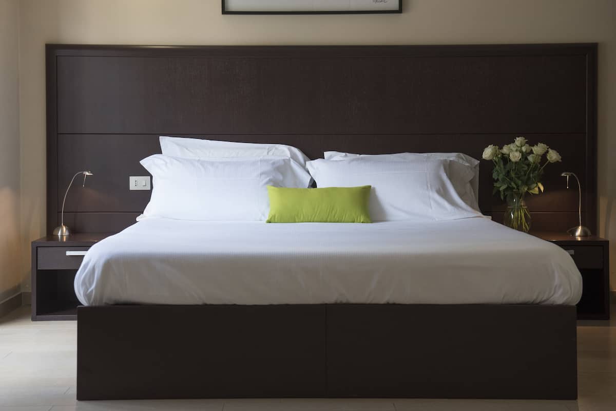 family room | down duvets, pillow-top beds, in-room safe, desk