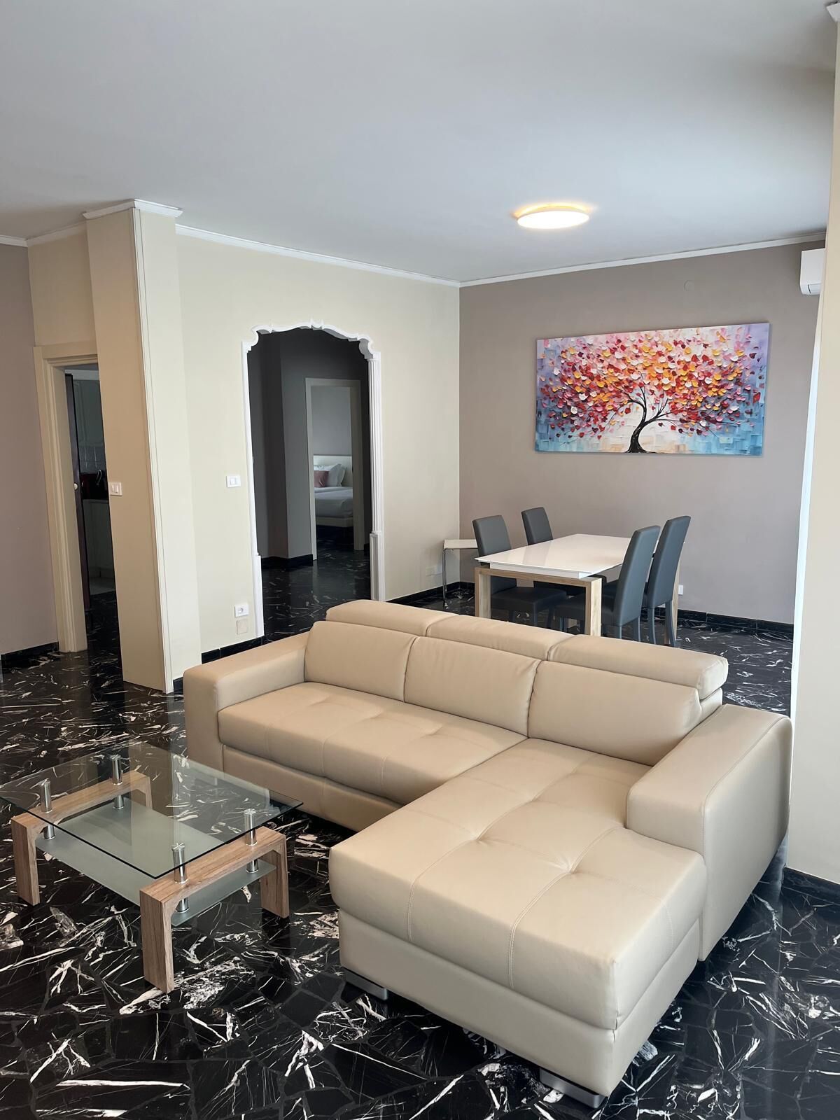 Deluxe Condo | Living area | 36-inch LCD TV with satellite channels, TV, pay films