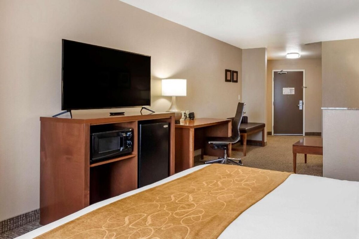 Desk, laptop workspace, blackout curtains, iron/ironing board