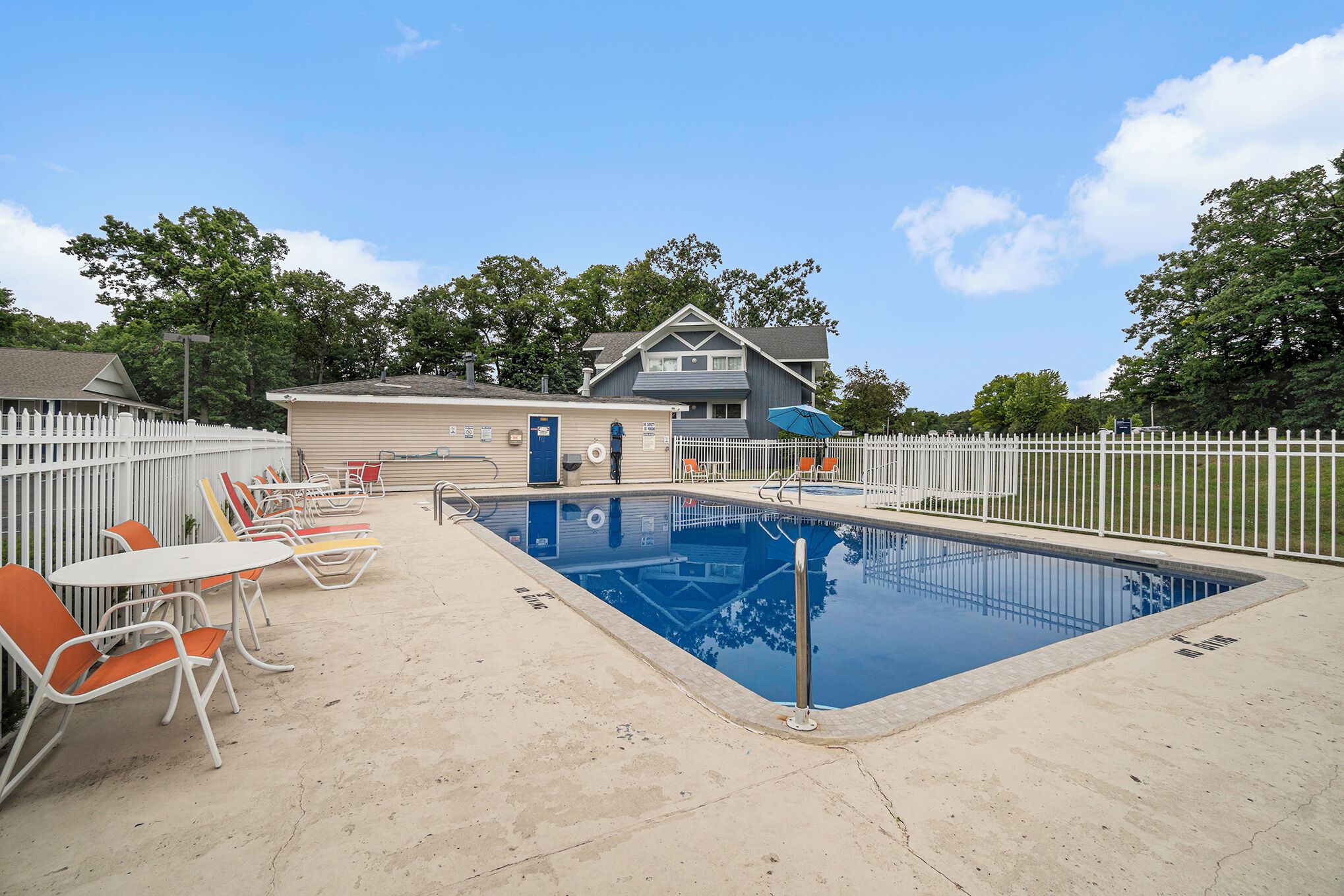 Seasonal outdoor pool, open 10:00 AM to 9:00 PM, pool umbrellas